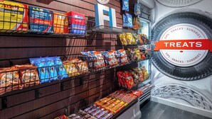 A grocery store display with snacks and treats. - Hampton Inn Tallahassee-Central (Tallahassee)