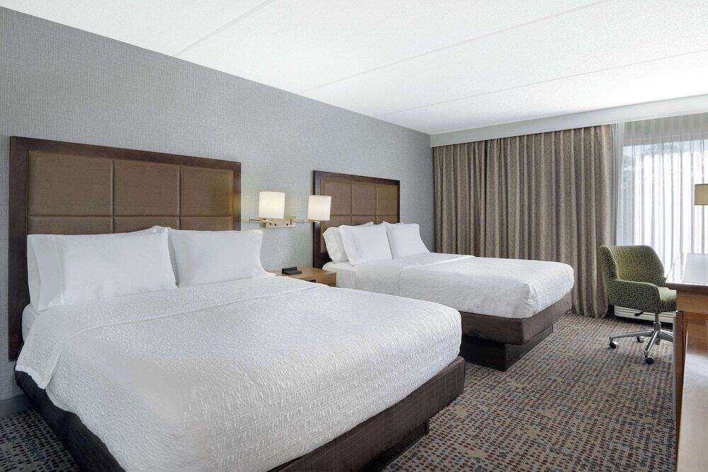 Premium bedding, blackout curtains, iron/ironing board