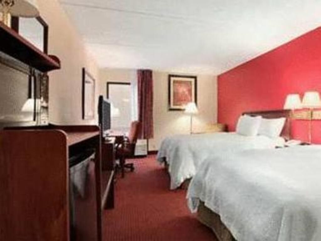 Premium bedding, blackout curtains, iron/ironing board