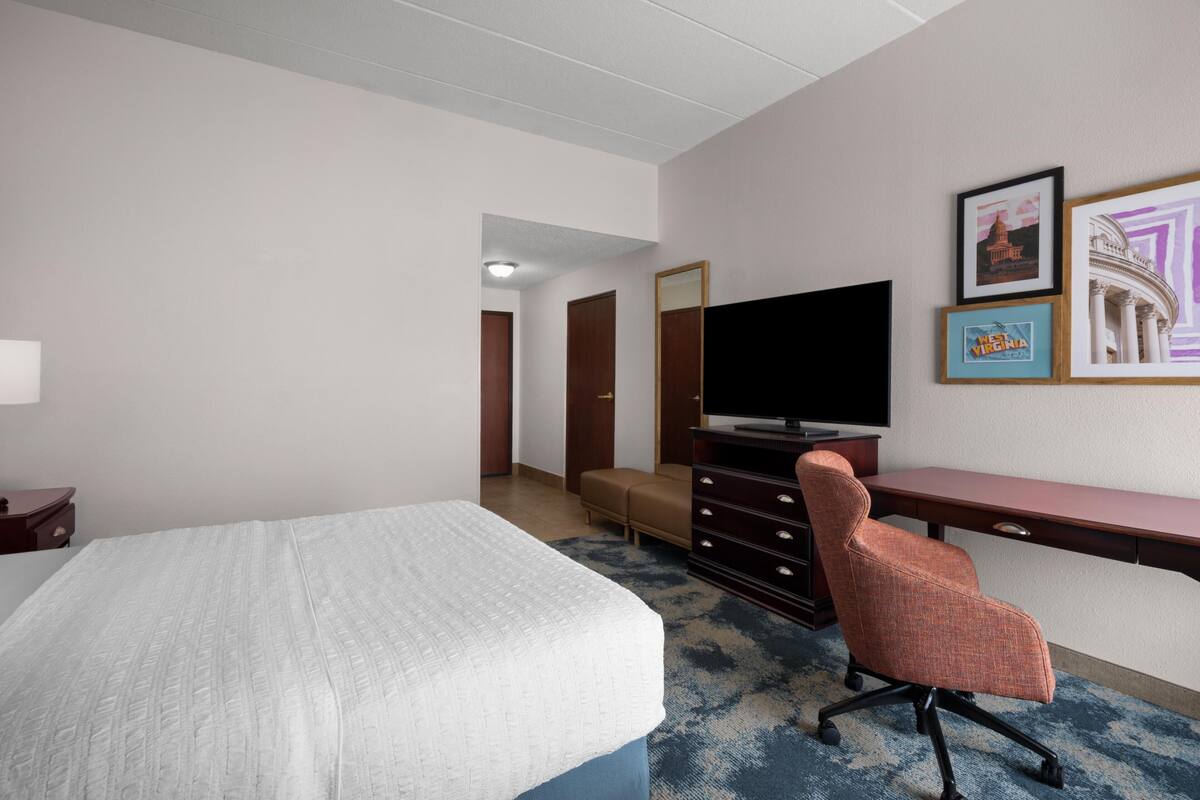 Premium bedding, pillow-top beds, blackout curtains, iron/ironing board