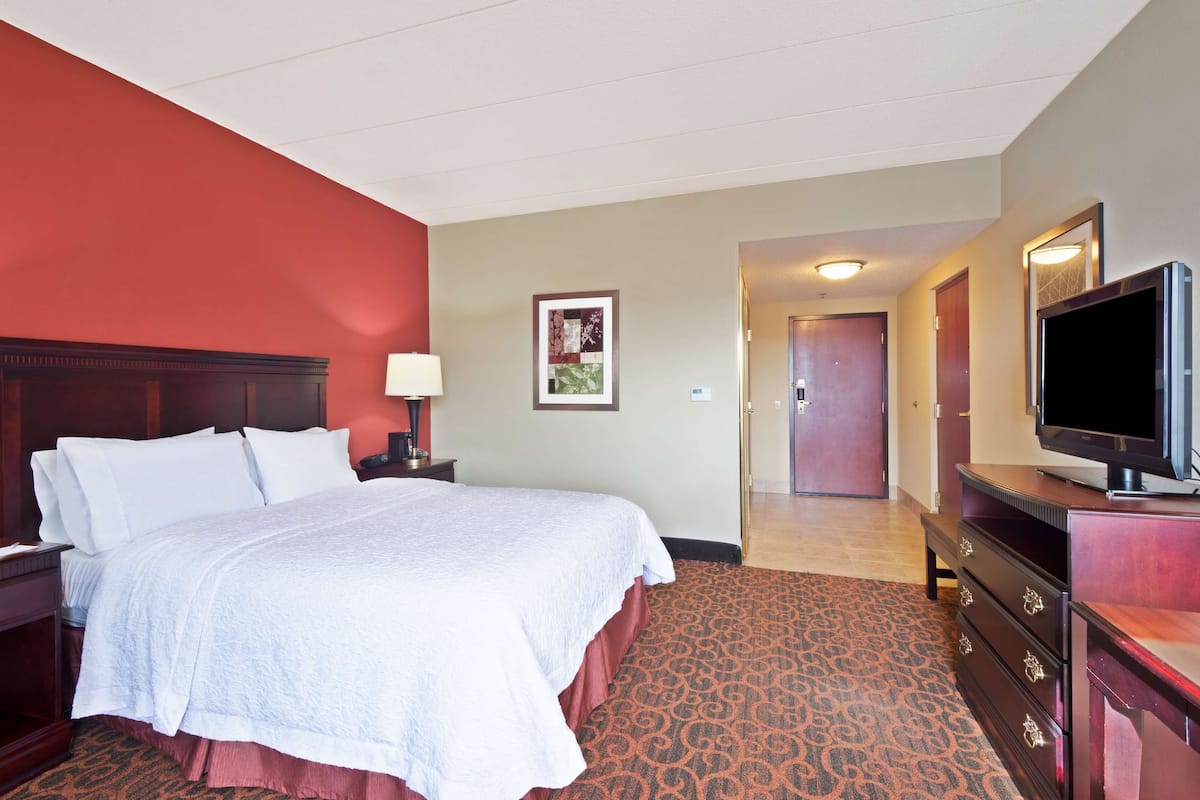 Premium bedding, pillow-top beds, blackout curtains, iron/ironing board