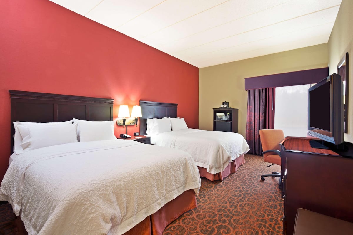 Premium bedding, pillow-top beds, blackout curtains, iron/ironing board