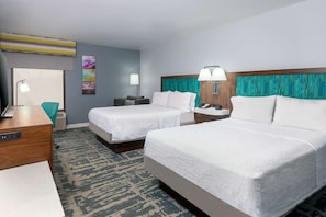 Premium bedding, pillow-top beds, blackout curtains, iron/ironing board