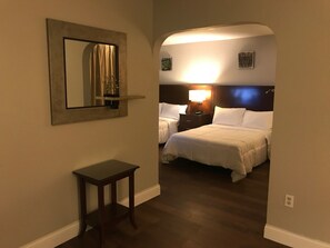 Luxury Suite, 2 Double Beds, Refrigerator & Microwave | Desk, iron/ironing board, free cribs/infant beds, rollaway beds