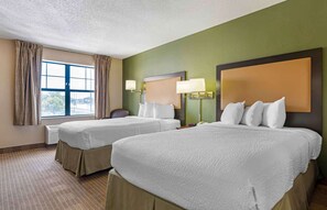 A hotel room with two beds, a large window, and a view of the outdoors. - Extended Stay America Select Suites Chicago Hanover Park (Hanover Park)
