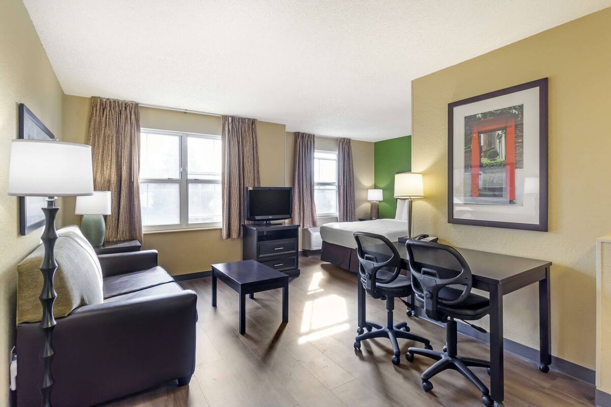 deluxe studio, 1 queen bed with sofa bed, non smoking | desk, iron/ironing board, free wifi, bed sheets