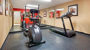 A gym with exercise equipment including a treadmill, elliptical, and stationary bike. - Extended Stay America Suites Richmond W Broad St Glenside N (Richmond)