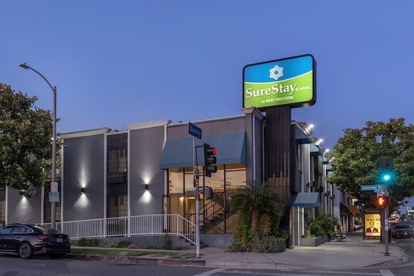 A hotel with a large sign advertising 'SureStay by BEST WESTERN'.