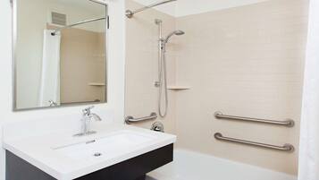 Combined shower/bathtub, hydromassage showerhead, hair dryer, towels