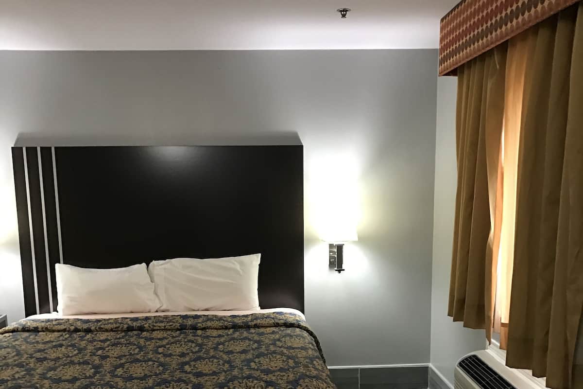 Blackout curtains, iron/ironing board, rollaway beds, free WiFi