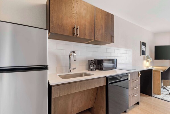 Studio Suite, 1 Queen Bed, Accessible (Mobility Tub) | Private kitchenette | Full-sized fridge, microwave, stovetop, dishwasher