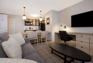 Suite, 1 Queen Bed with Sofa bed (One Bedroom) | Living area | Flat-screen TV