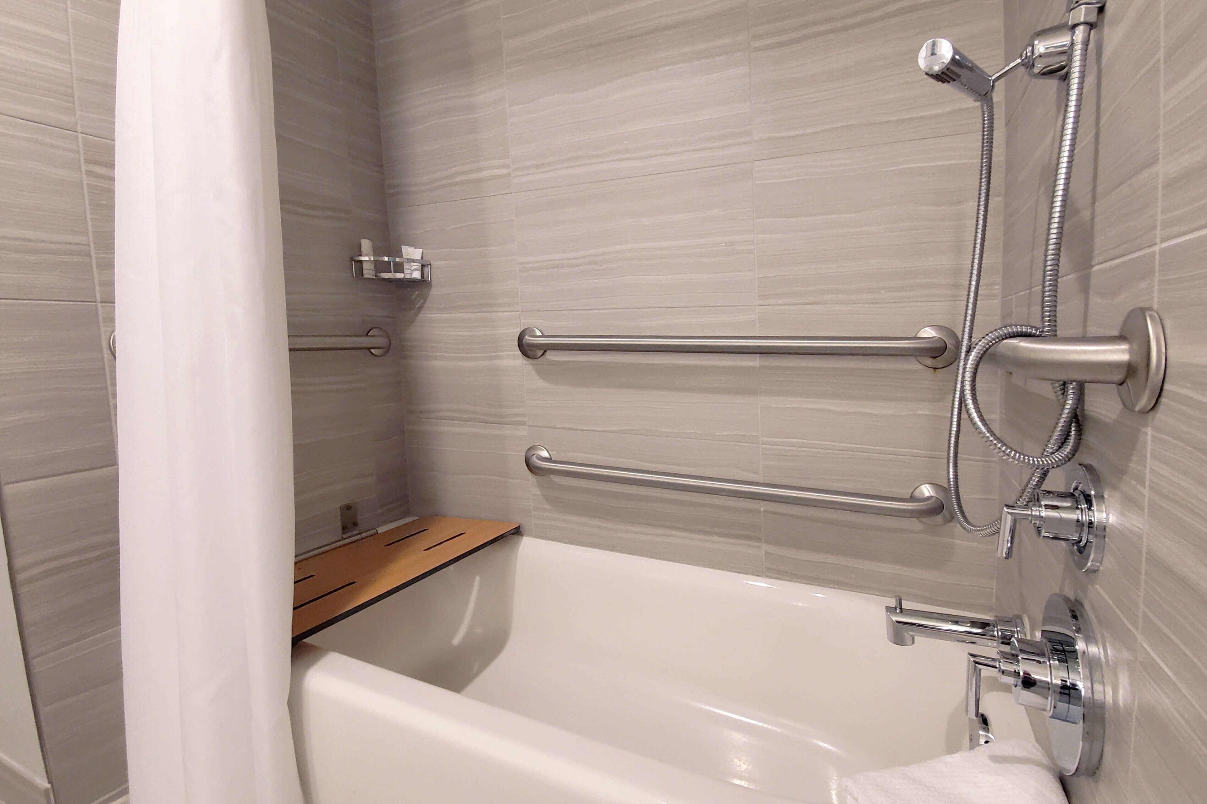 designer toiletries, hair dryer, towels, soap