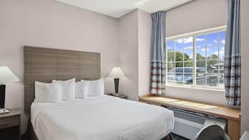 Suite, 1 Queen Bed | Desk, blackout drapes, iron/ironing board, rollaway beds