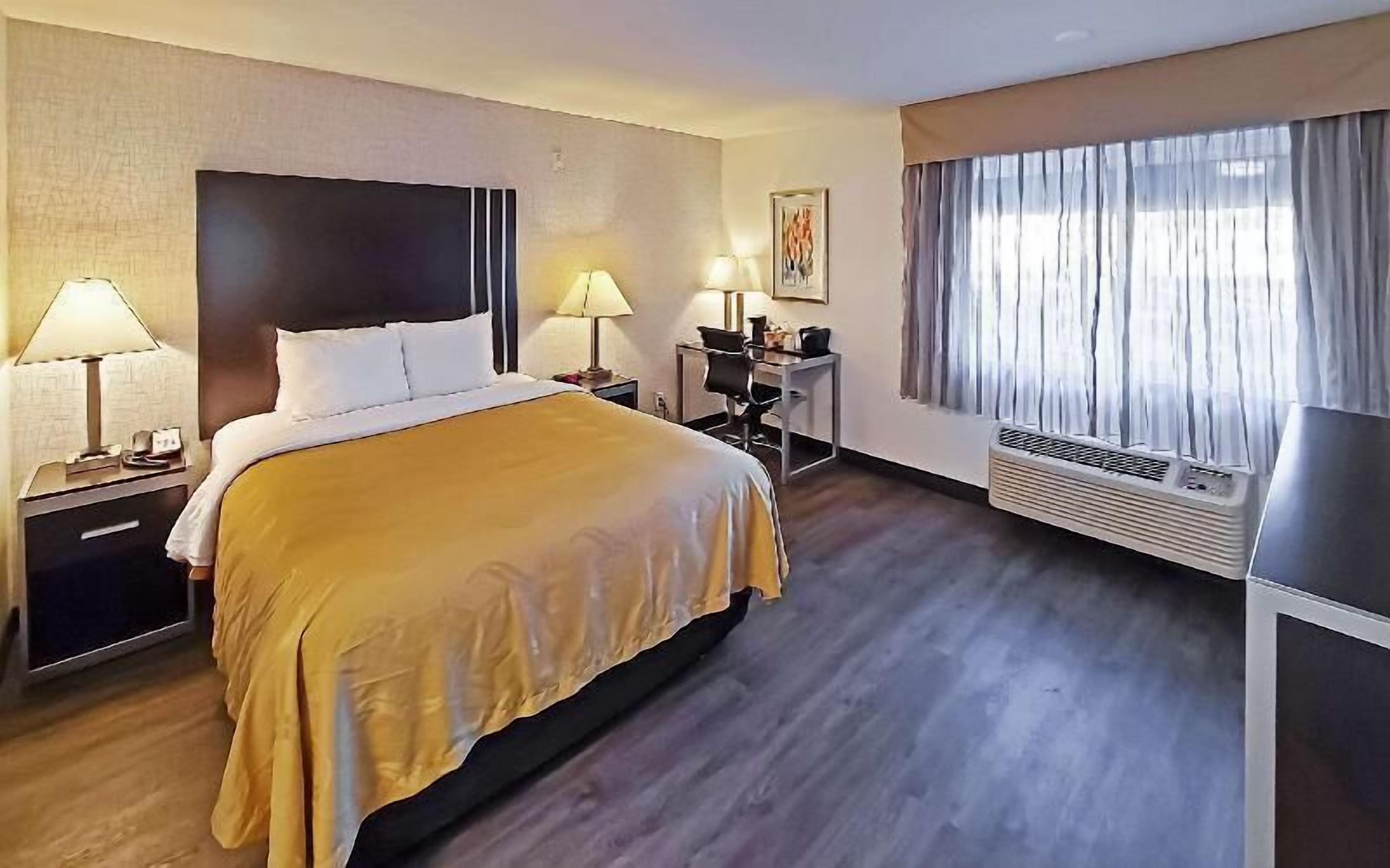Pillowtop beds, desk, laptop workspace, blackout drapes