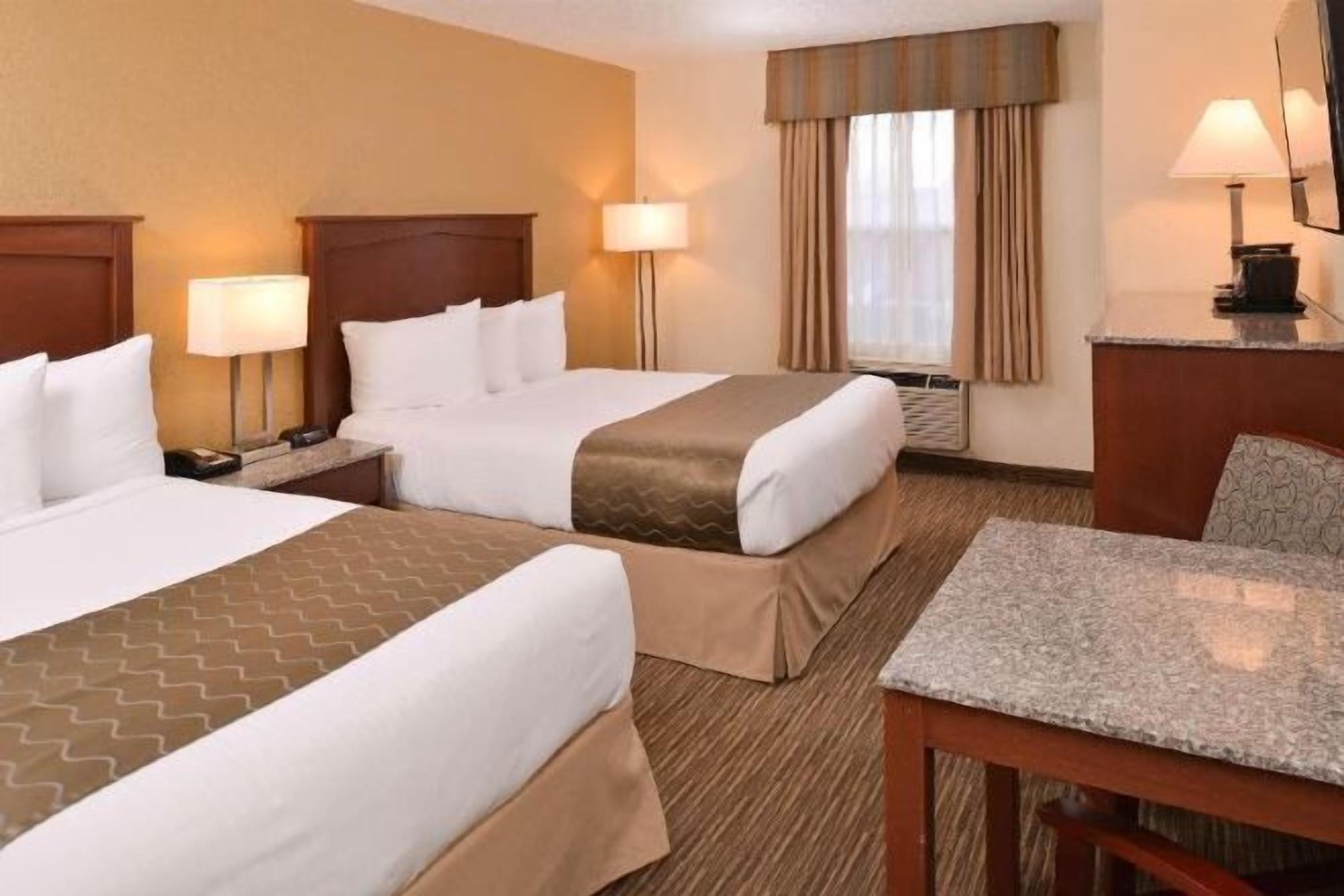 Premium bedding, desk, blackout drapes, iron/ironing board