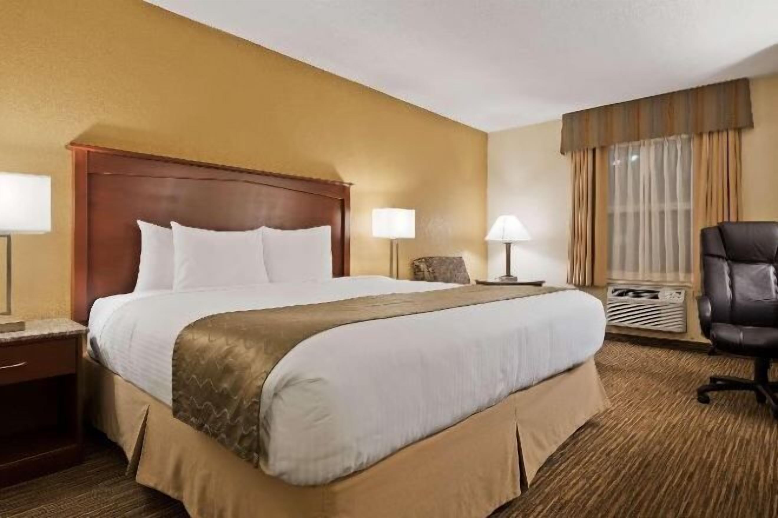 Premium bedding, desk, blackout drapes, iron/ironing board