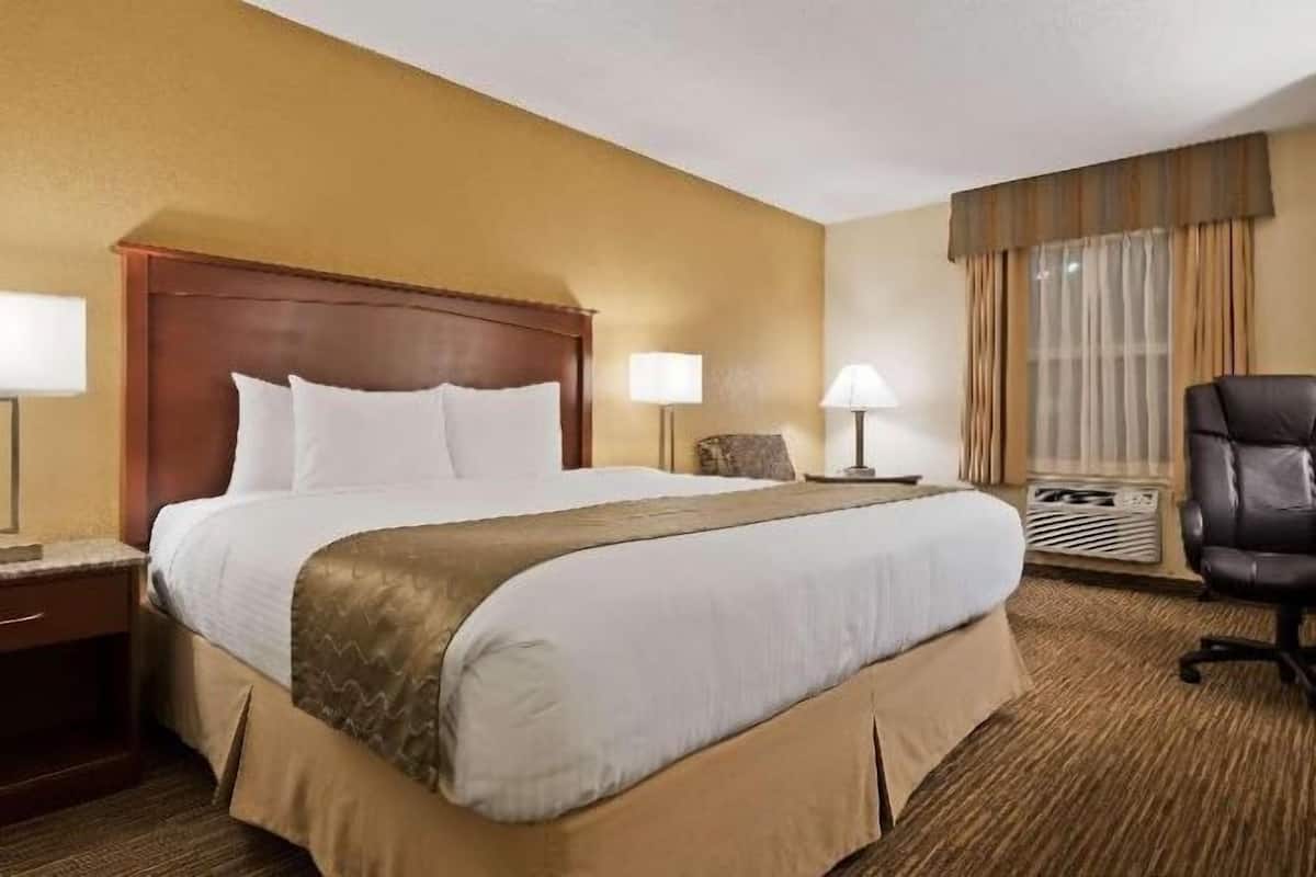 Premium bedding, desk, blackout drapes, iron/ironing board