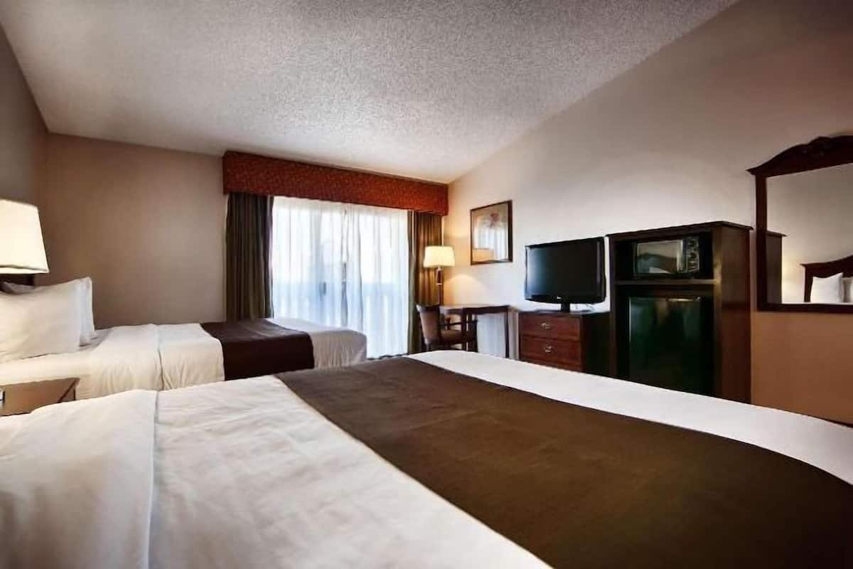 Desk, iron/ironing board, free cribs/infant beds, rollaway beds