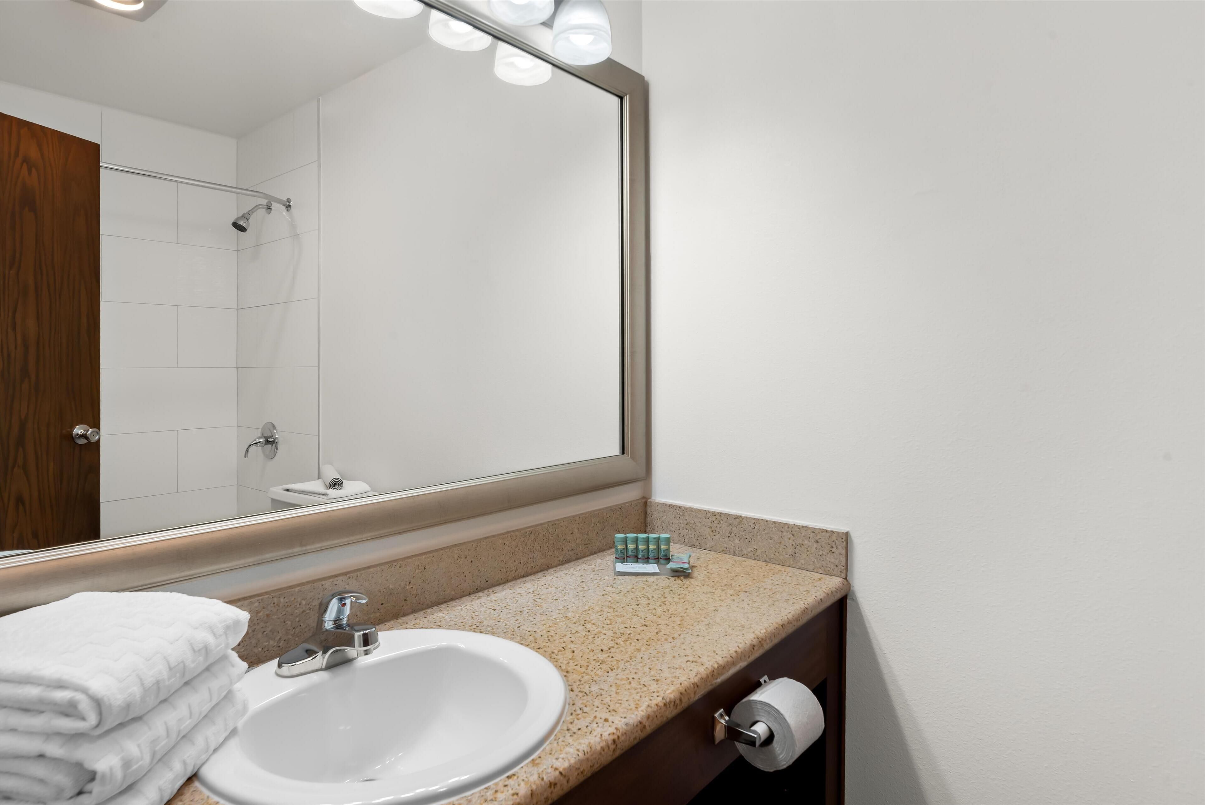 standard room, 2 queen beds, non smoking, refrigerator & microwave | bathroom | combined shower/bathtub, free toiletries, hair dryer, towels