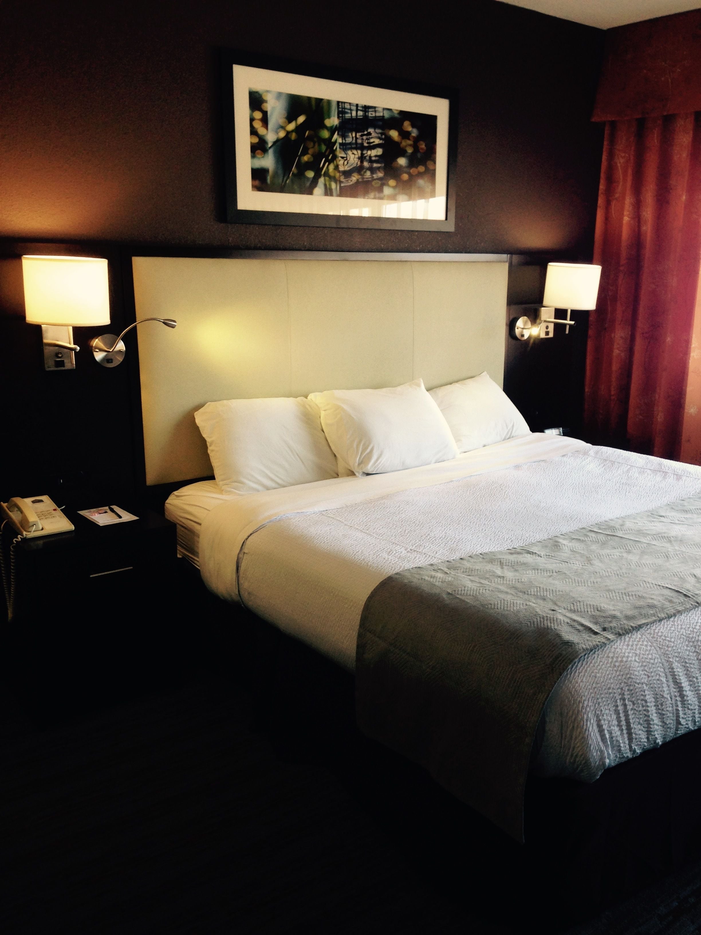 premium bedding, down duvets, pillow-top beds, blackout curtains