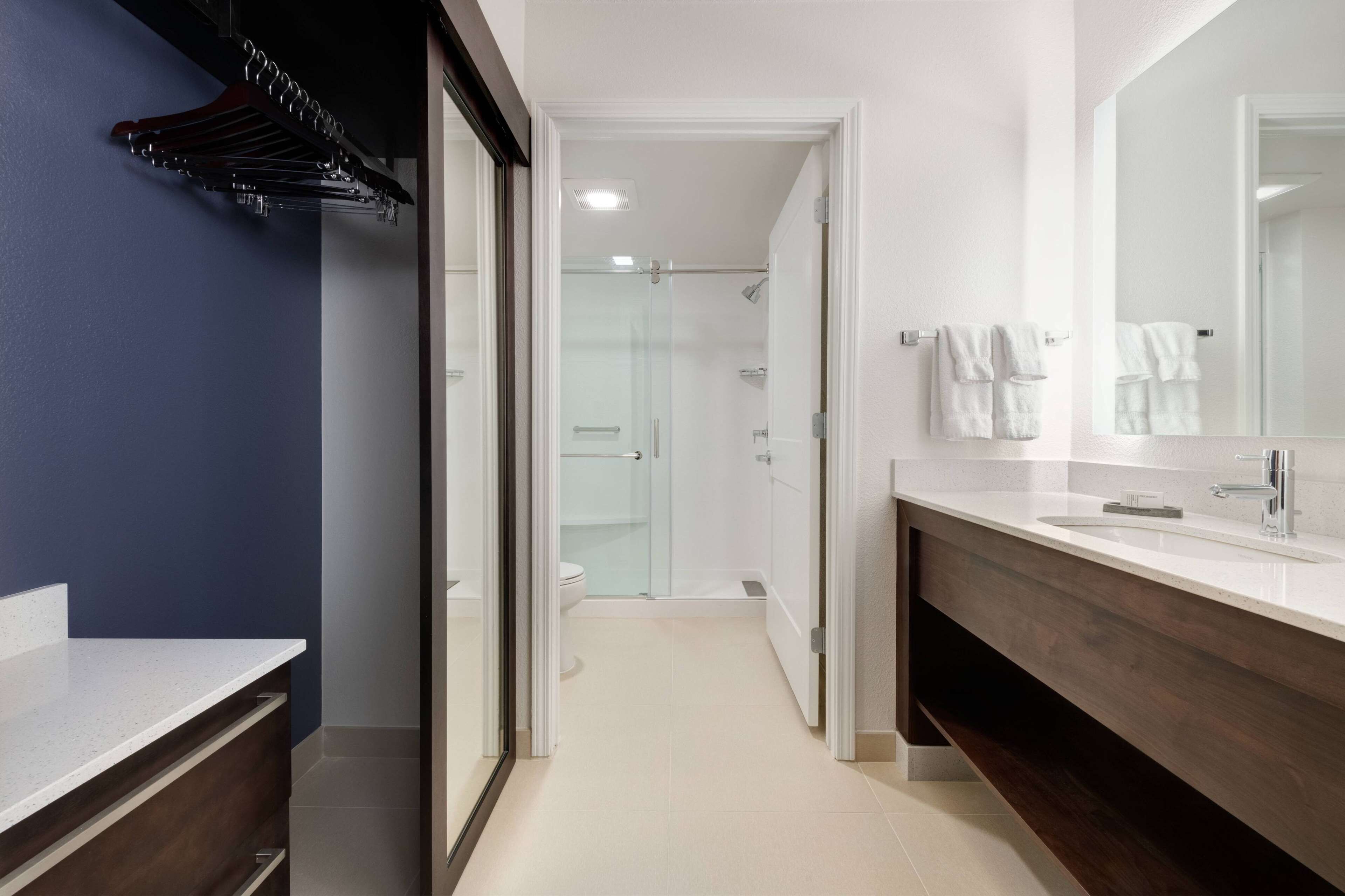 deluxe studio suite, 1 king bed with sofa bed, accessible (hearing) | bathroom | combined shower/bathtub, free toiletries, hair dryer, towels