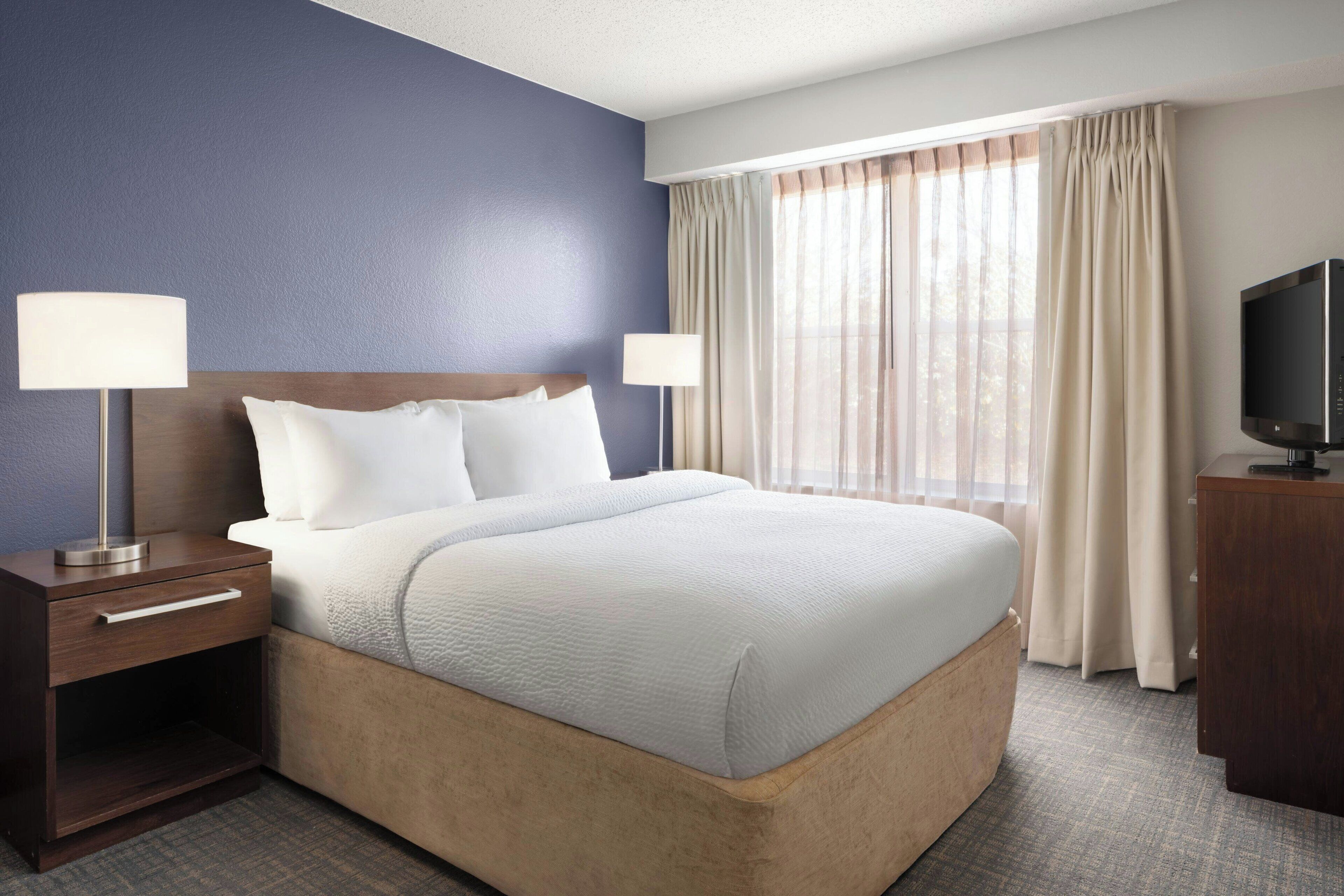 Suite, 2 Bedrooms | Desk, laptop workspace, iron/ironing board, travel crib