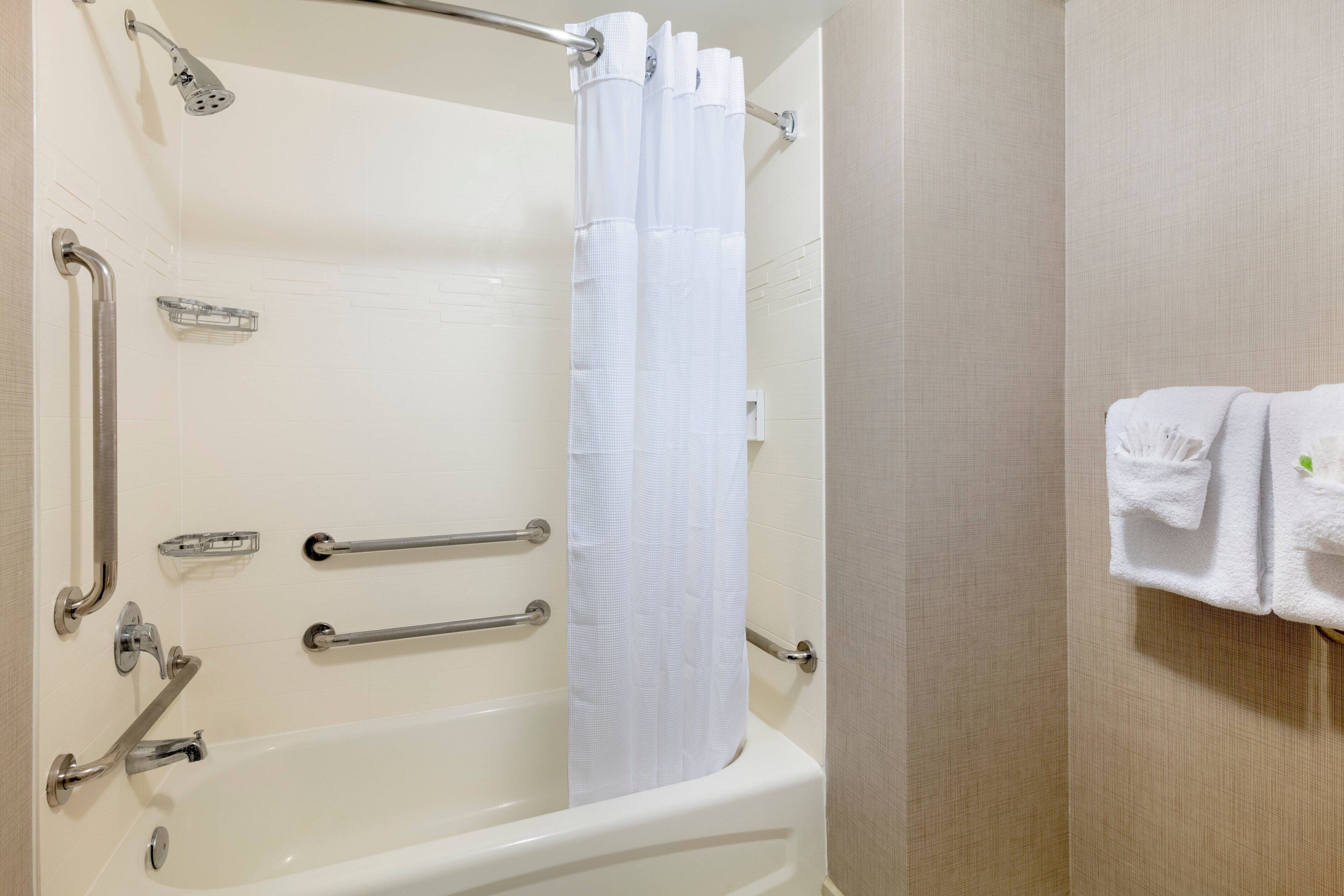 combined shower/bathtub, free toiletries, hair dryer, towels