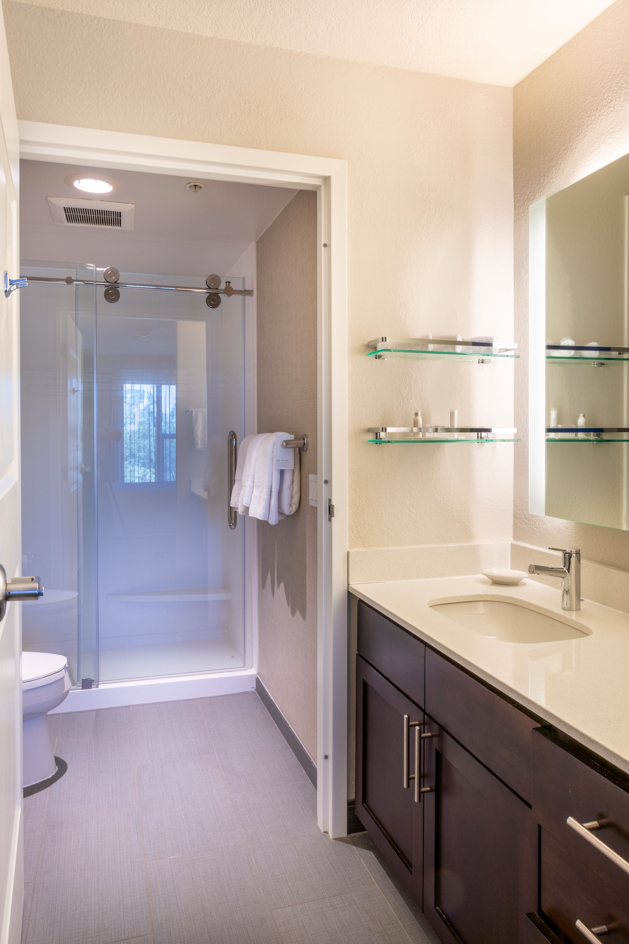 combined shower/bathtub, free toiletries, hair dryer, towels