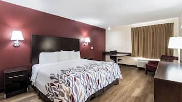 Tabla de planchar con plancha, wifi gratis, ropa de cama