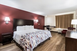 Tabla de planchar con plancha, wifi gratis y ropa de cama 