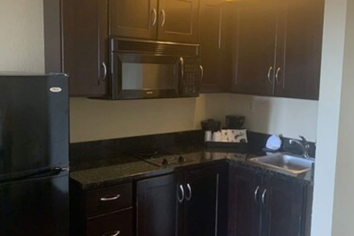 premium bedding, pillow-top beds, desk, blackout curtains