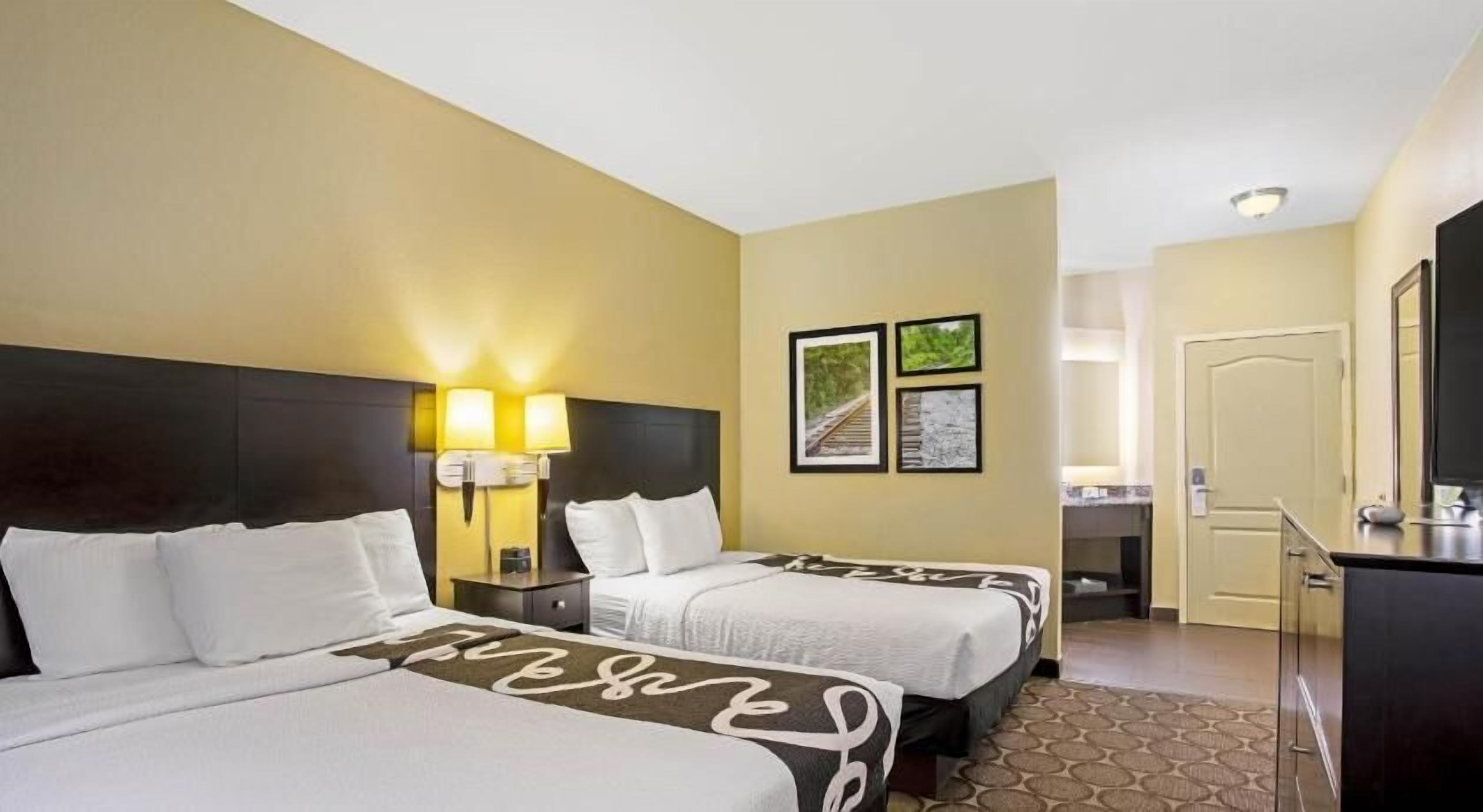 Premium bedding, pillowtop beds, desk, blackout drapes