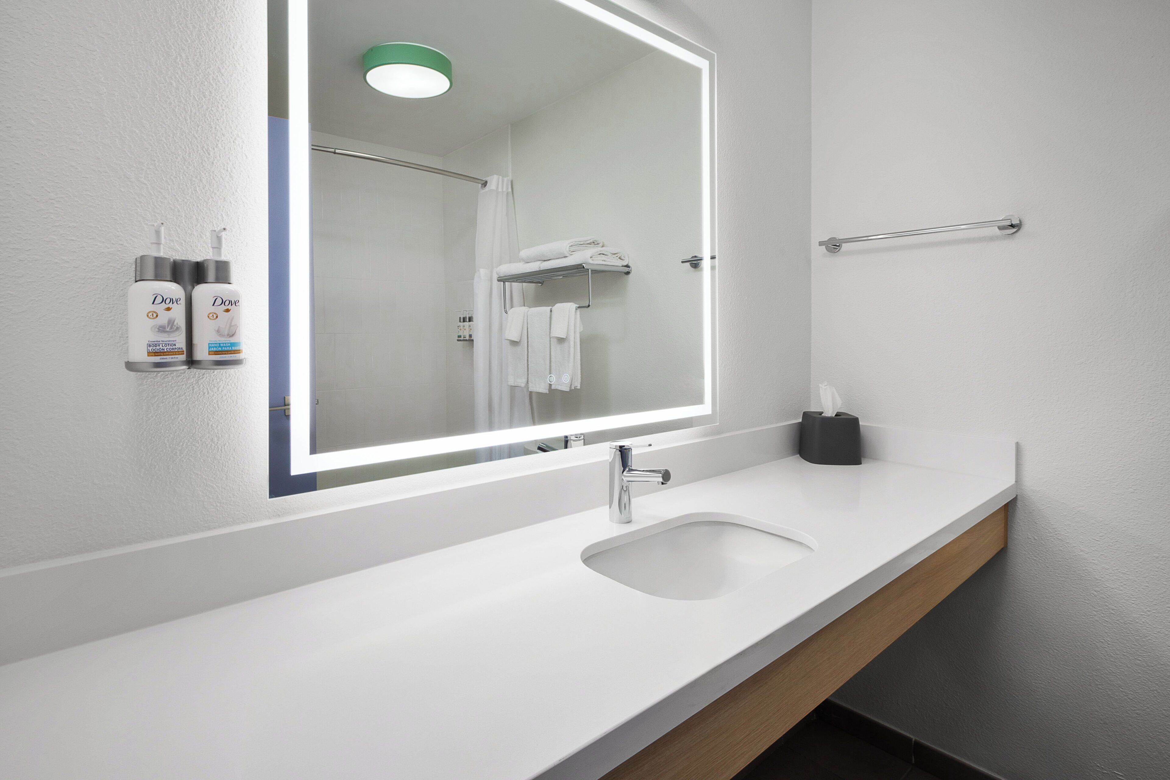 Combined shower/tub, hair dryer, towels, soap