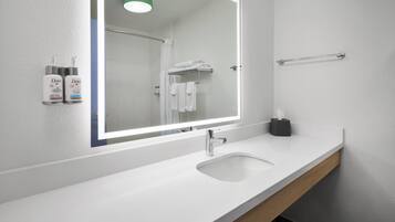Combined shower/tub, hair dryer, towels, soap