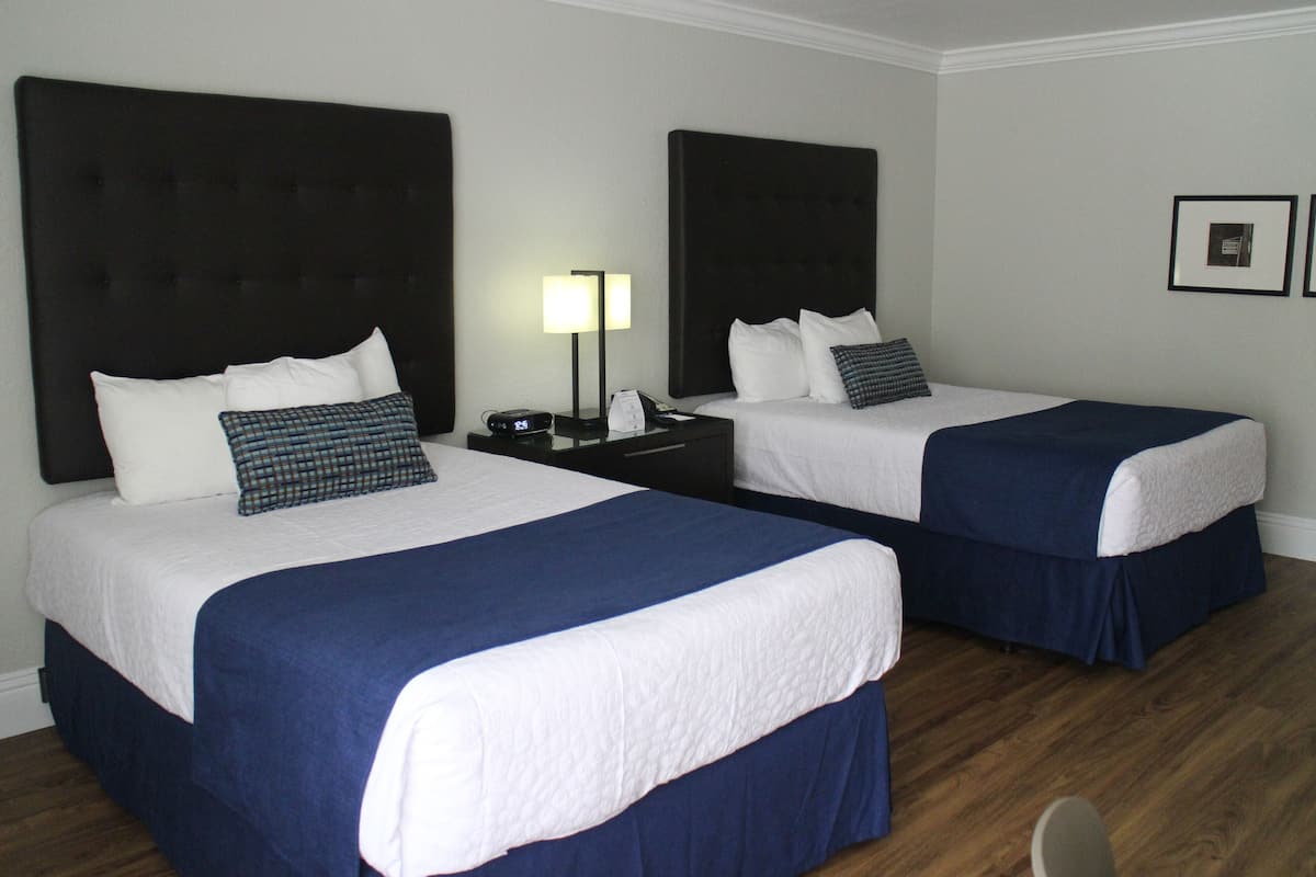 Premium bedding, down duvets, pillow-top beds, in-room safe