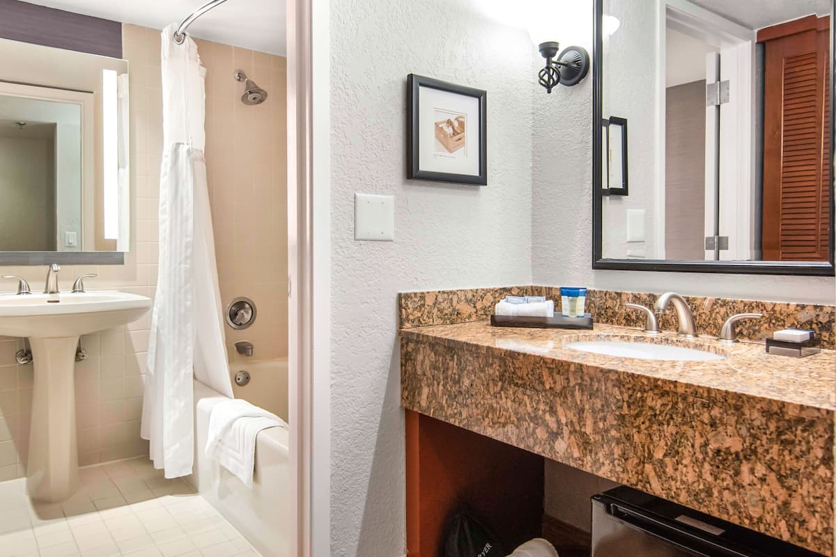 signature king bed | bathroom sink