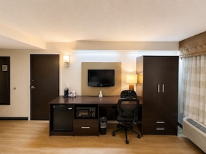 Desk, laptop workspace, blackout curtains, iron/ironing board