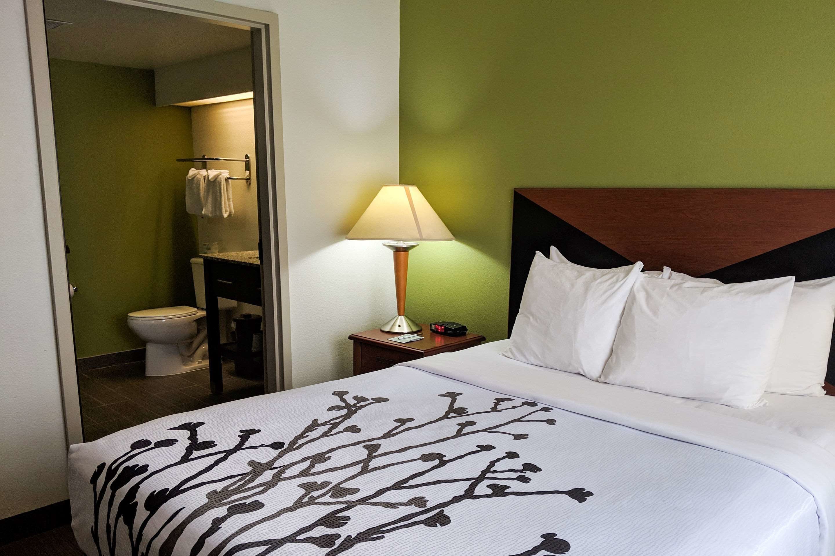 desk, laptop workspace, blackout curtains, iron/ironing board