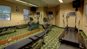 A gym with treadmills, stationary bikes, and weight machines. - Siegel Select Montgomery (Montgomery)