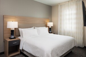 Suite, 2 Bedrooms | Hypo-allergenic bedding, desk, iron/ironing board