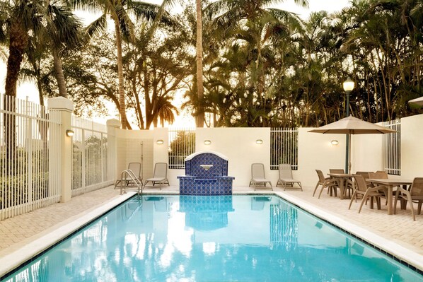 Outdoor pool, pool umbrellas, sun loungers