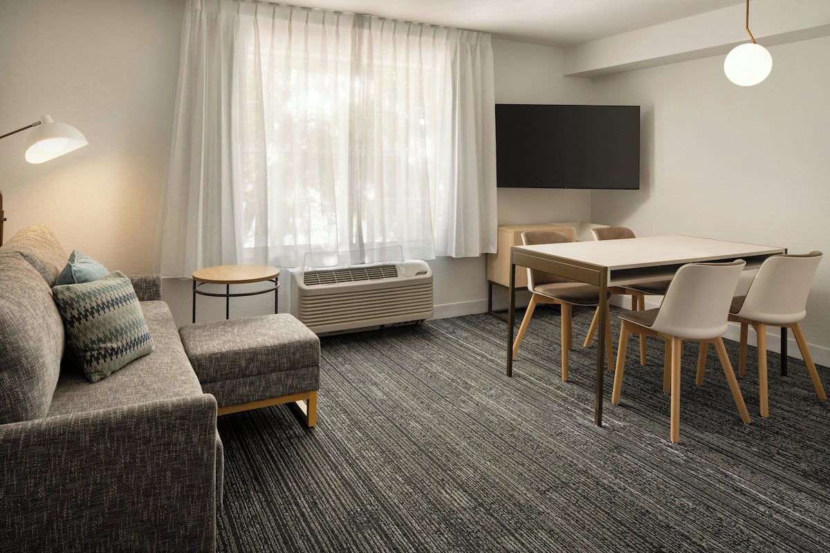 Suite, 1 Bedroom, Non Smoking | Living room | TV, video-game console