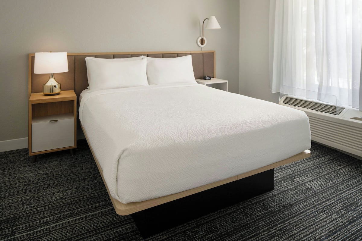 Suite, 1 Bedroom, Non Smoking | In-room safe, desk, iron/ironing board, free cribs/infant beds