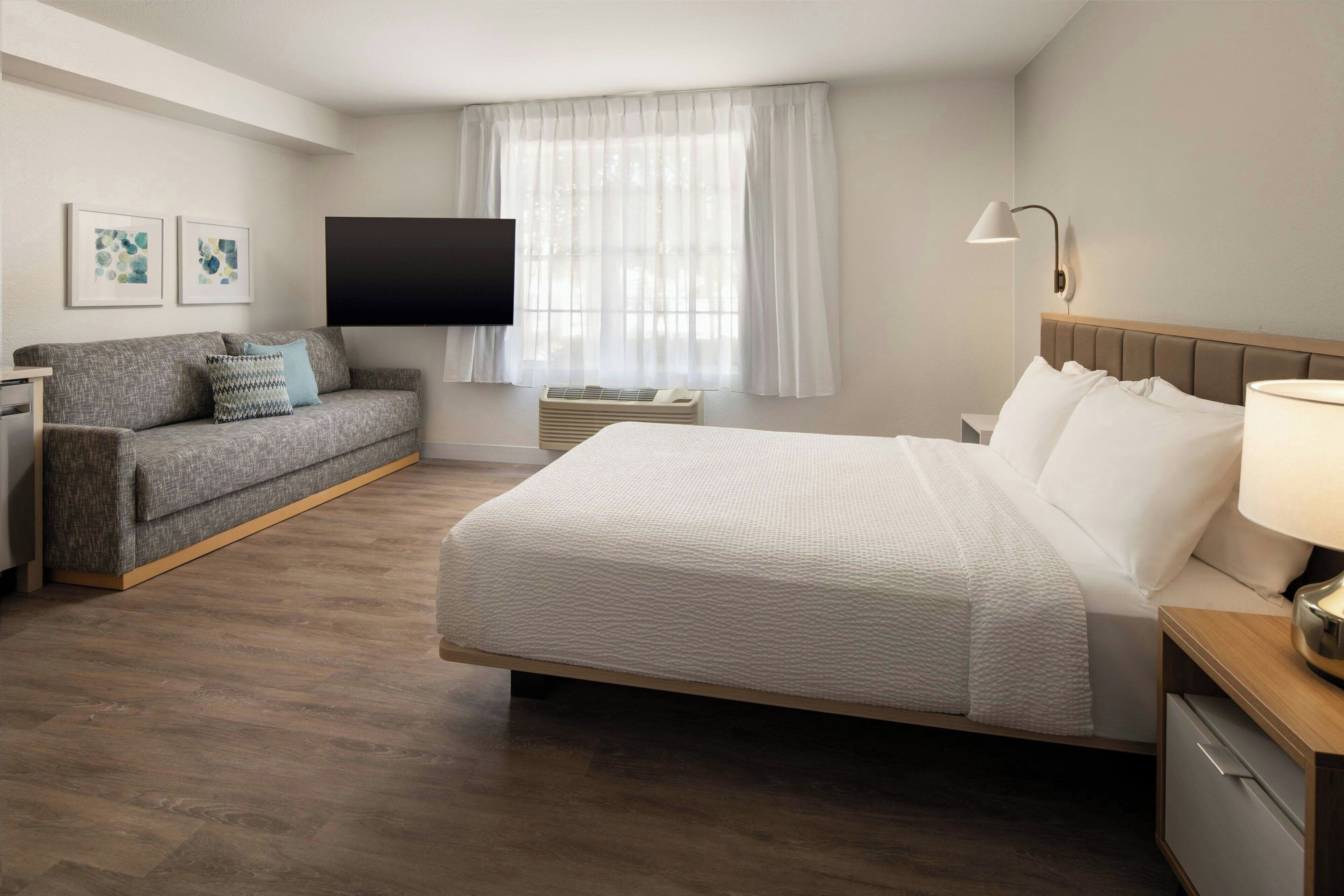 studio, 1 queen bed with sofa bed, non smoking | in-room safe, desk, iron/ironing board, free cots/infant beds