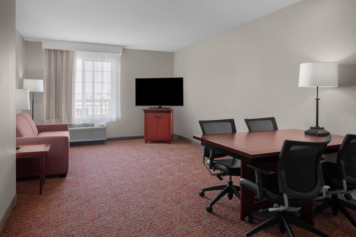 Grand Suite | Living area | LCD TV, DVD player, iPod dock