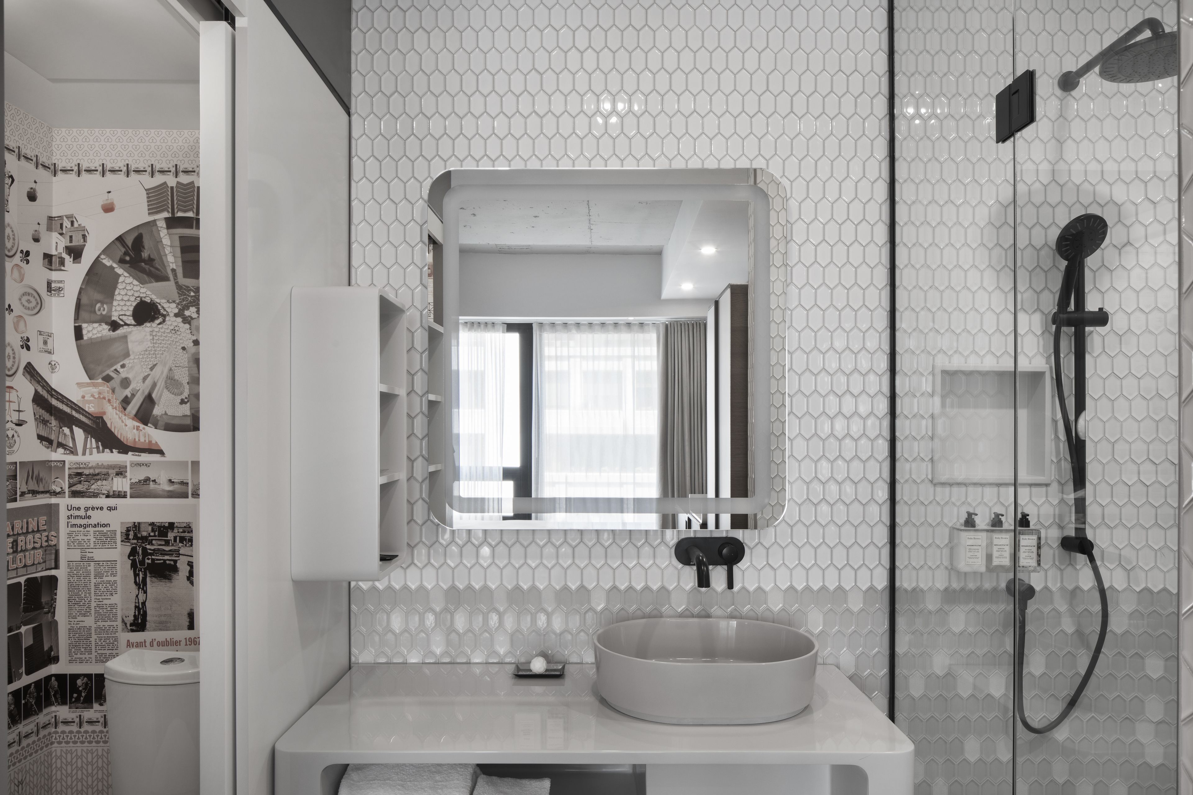 combined shower/bathtub, designer toiletries, hair dryer, bathrobes