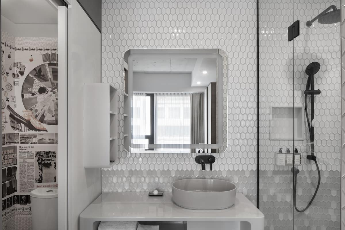 combined shower/bathtub, designer toiletries, hair dryer, bathrobes