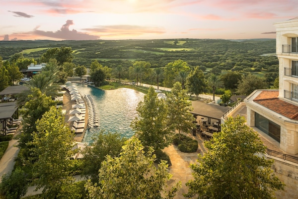 5 outdoor pools, a heated pool, cabanas (surcharge), pool umbrellas