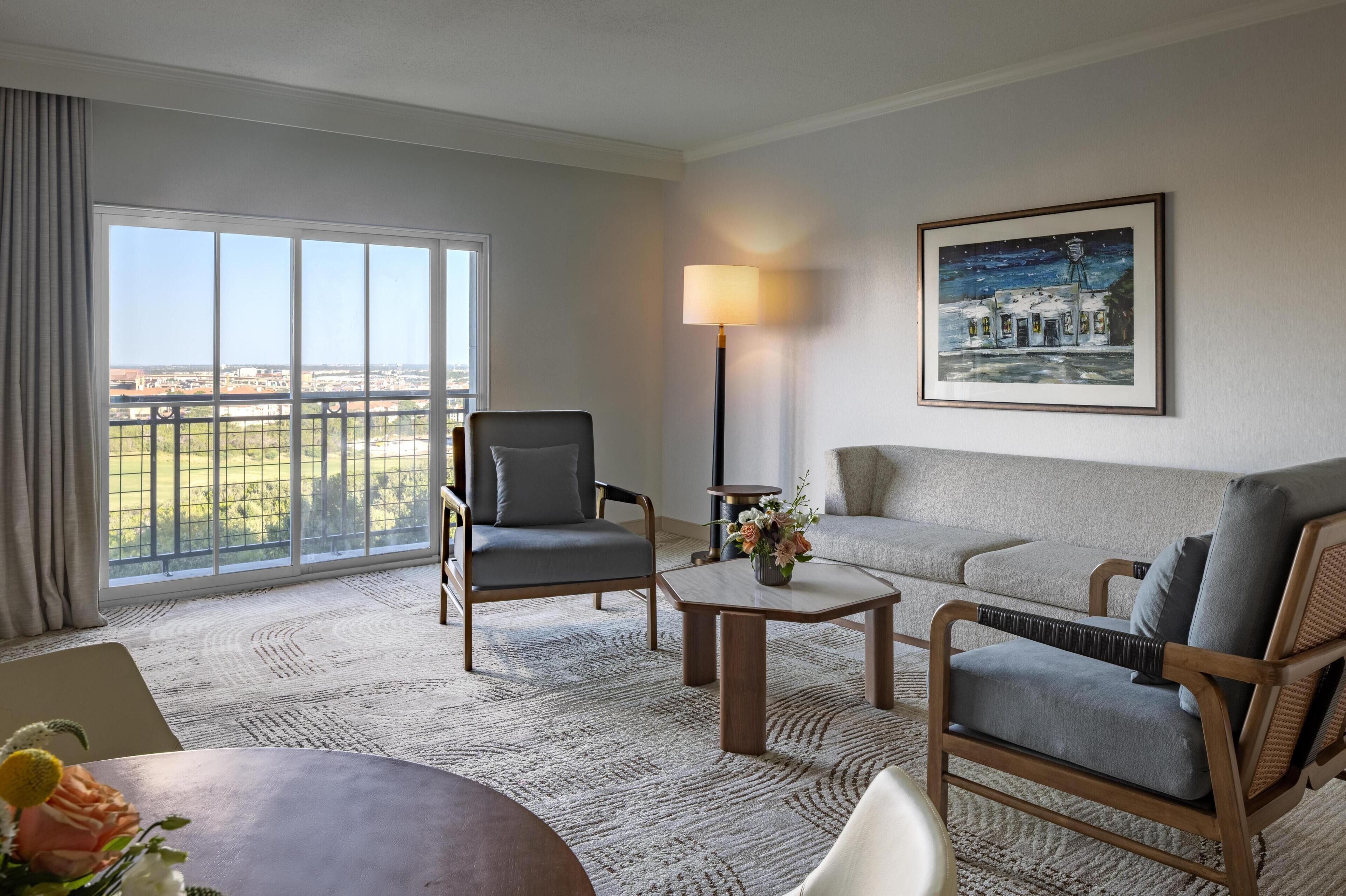 Suite, 1 King Bed, City View (Seven) | Living area | 42-inch flat-screen TV with satellite channels